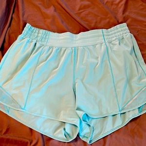 Lululemon Hotty hot high rise electric turquoise Size 14. Worn once.